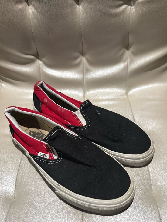 Vans Shoes - Vans Black Slip-On Sneakers with Red Lining